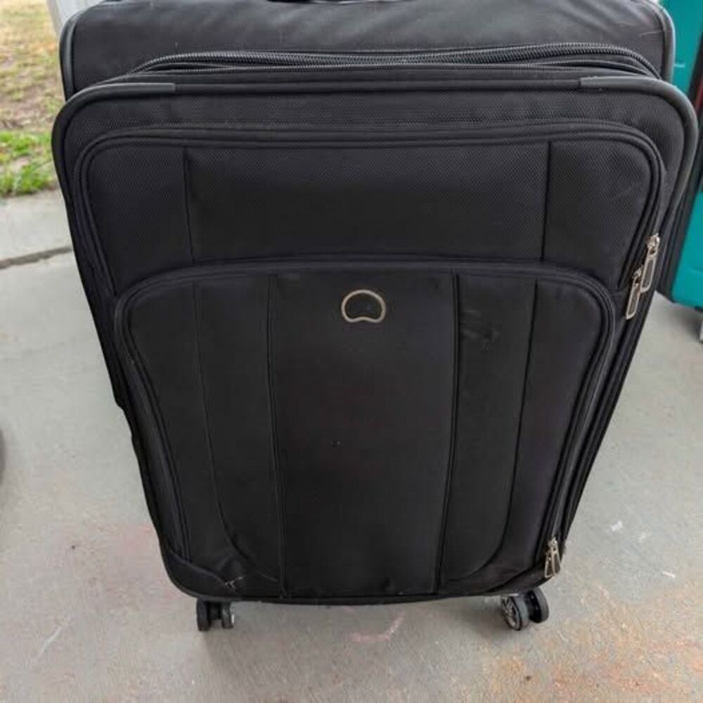 Delsey Large Spinner Suitcase